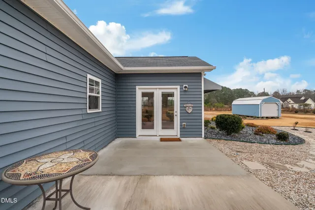 a view of living room filled with furniture