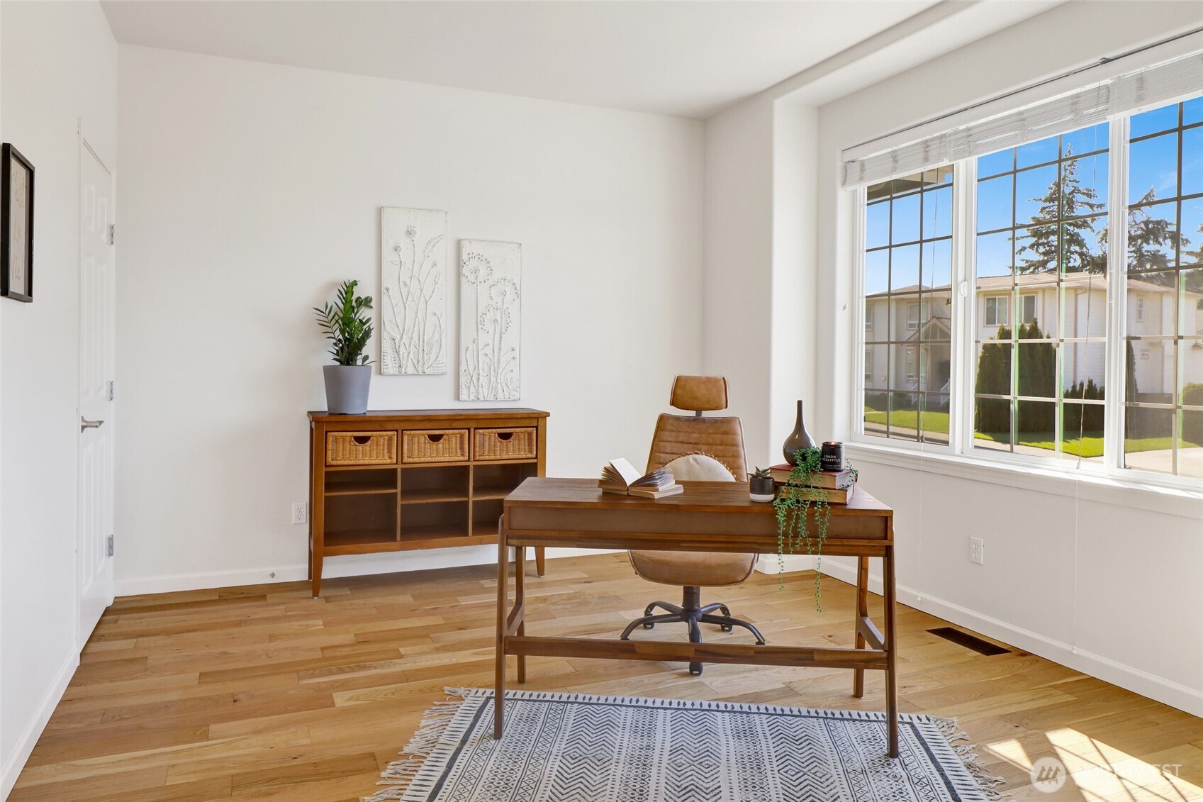 940 Nevada Street Bellingham, WA 98229 - Photo 5 of 31 a work room with furniture wooden floor and windows