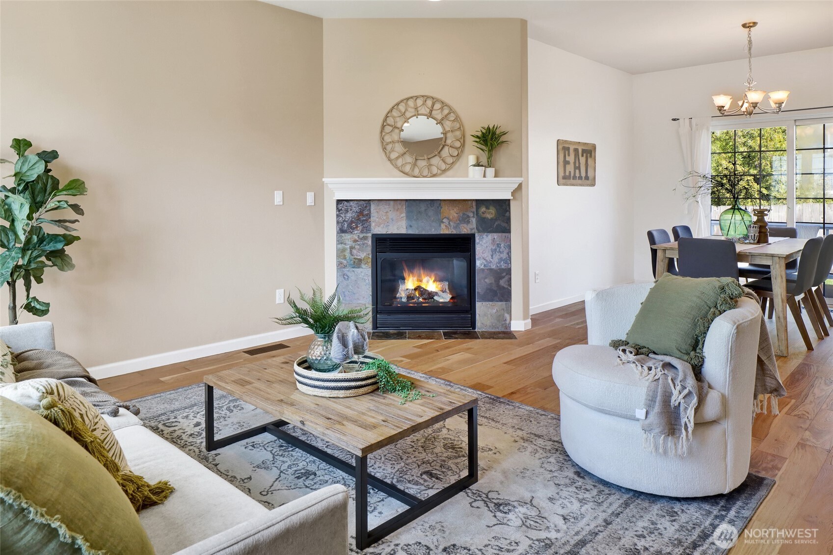 940 Nevada Street Bellingham, WA 98229 - Photo 7 of 31 a living room with furniture and a fireplace