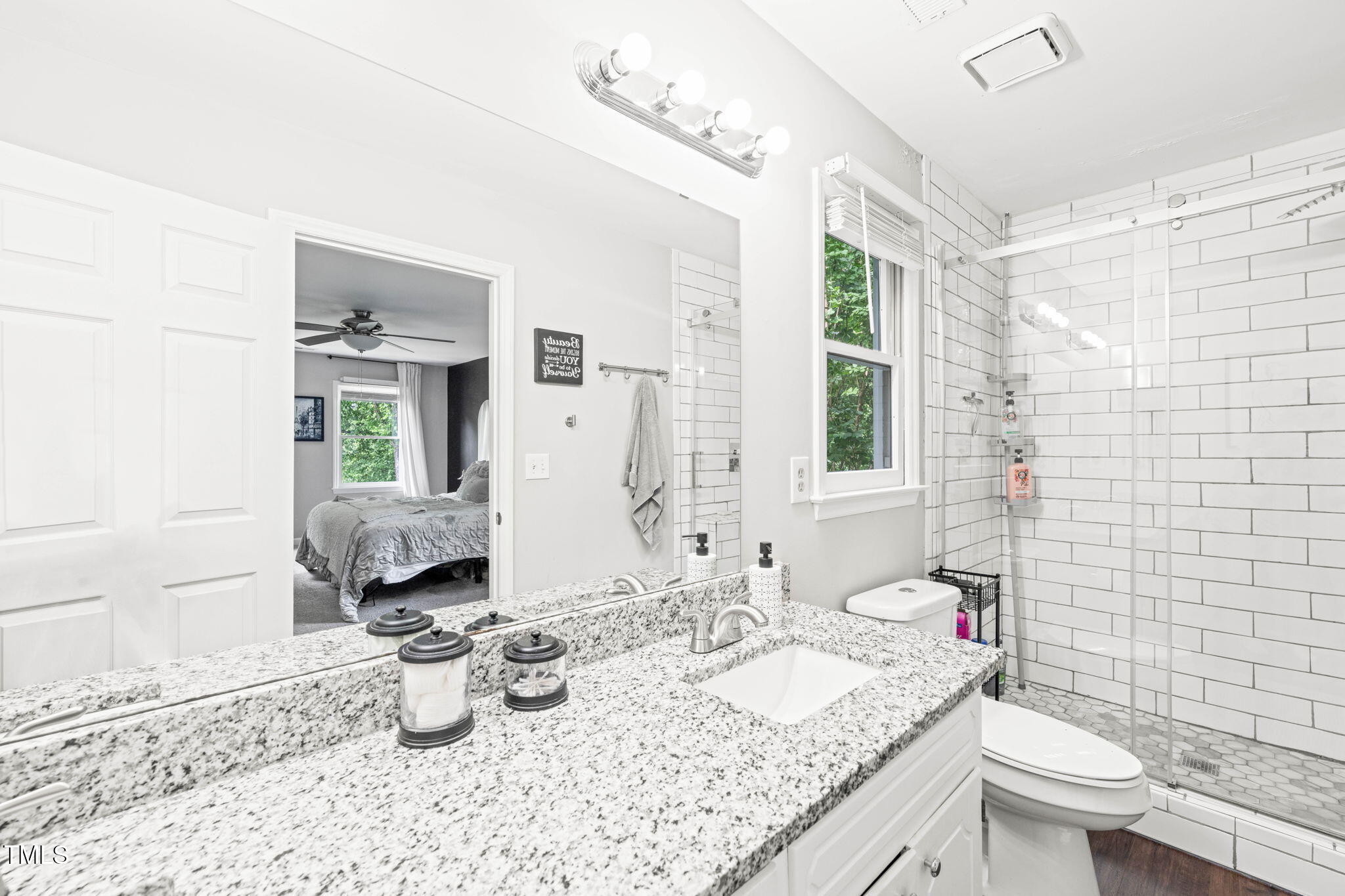 21 Cedar Hill Drive Durham, NC 27713 - Photo 17 of 45 a bathroom with a granite countertop sink mirror and toilet