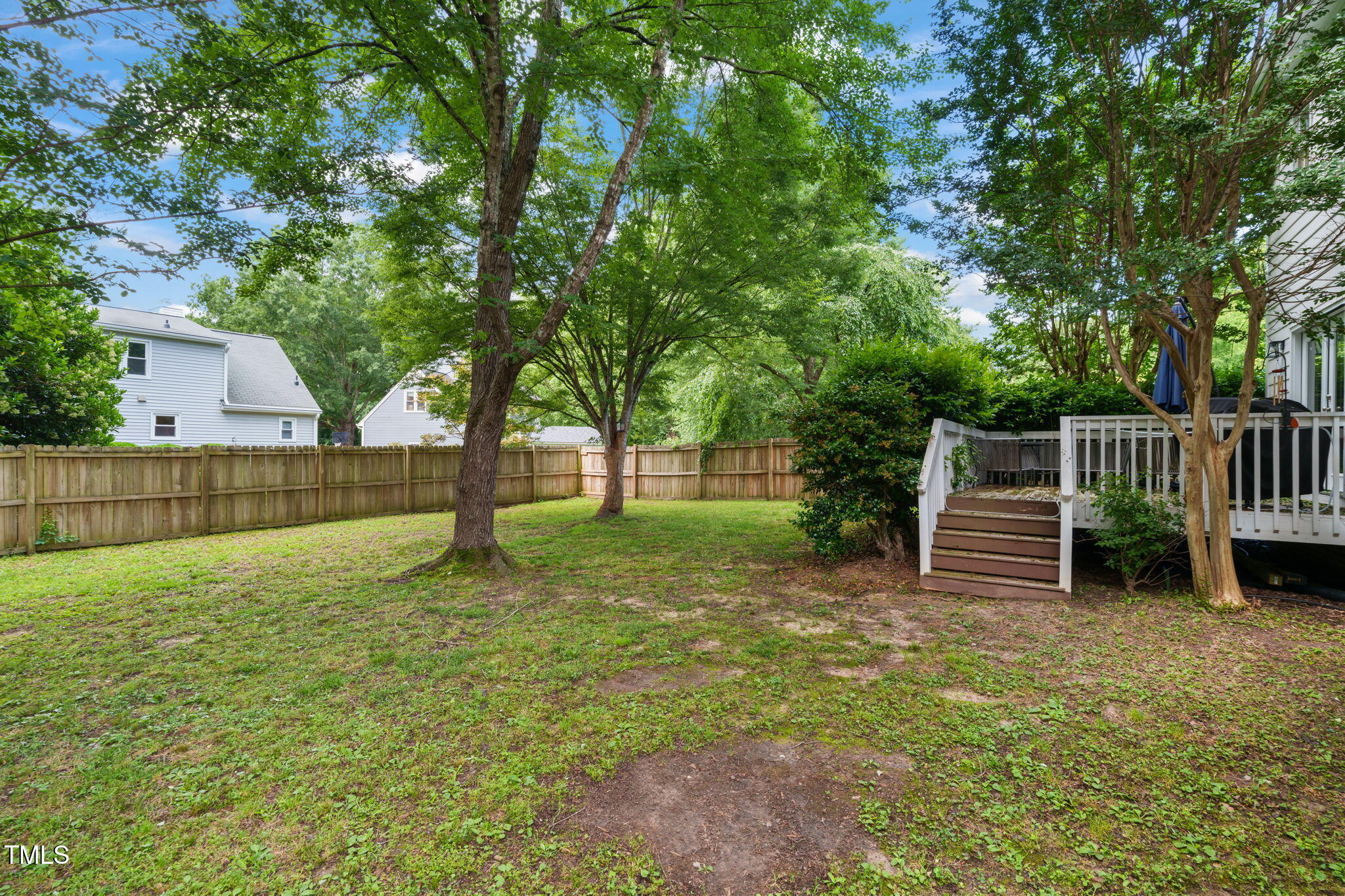 21 Cedar Hill Drive Durham, NC 27713 - Photo 29 of 45 a view of a deck with a trees