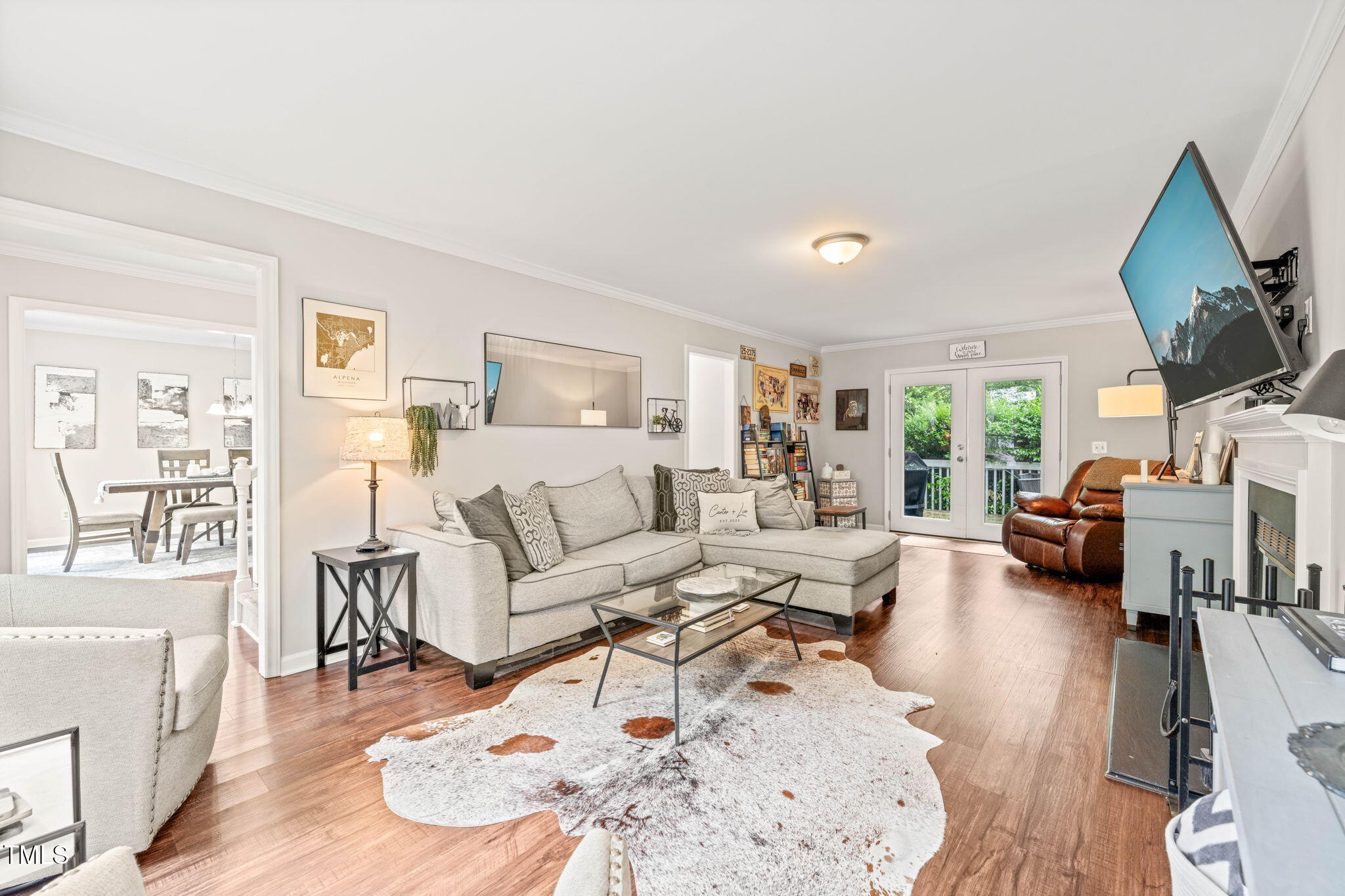 21 Cedar Hill Drive Durham, NC 27713 - Photo 2 of 45 a living room with furniture and a flat screen tv
