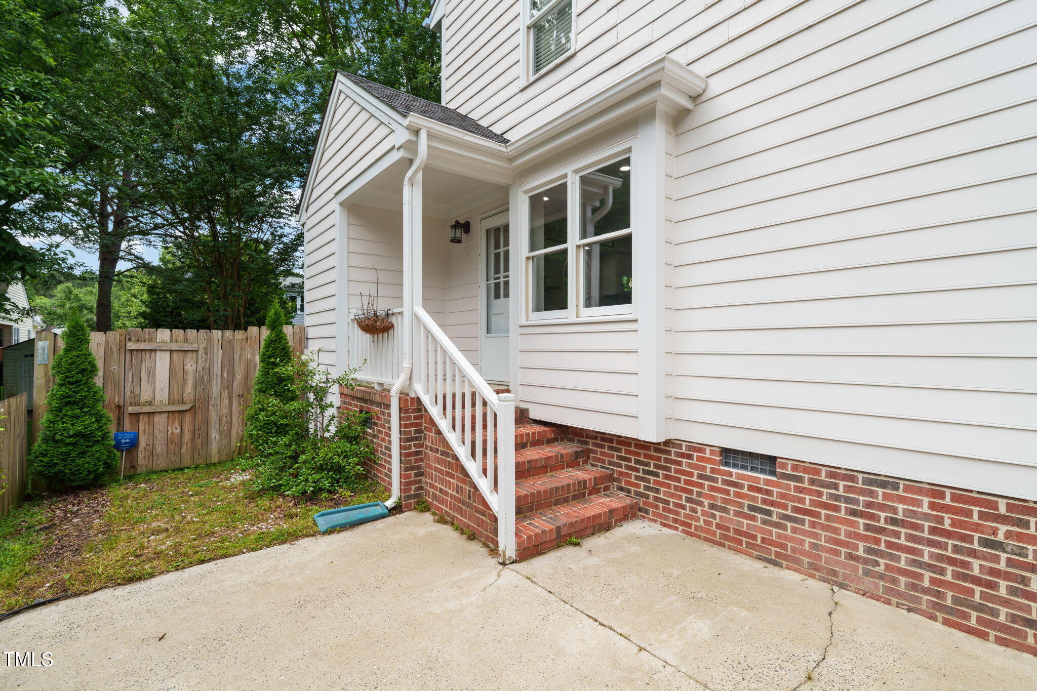 21 Cedar Hill Drive Durham, NC 27713 - Photo 32 of 45 a view of a small house with wooden fence