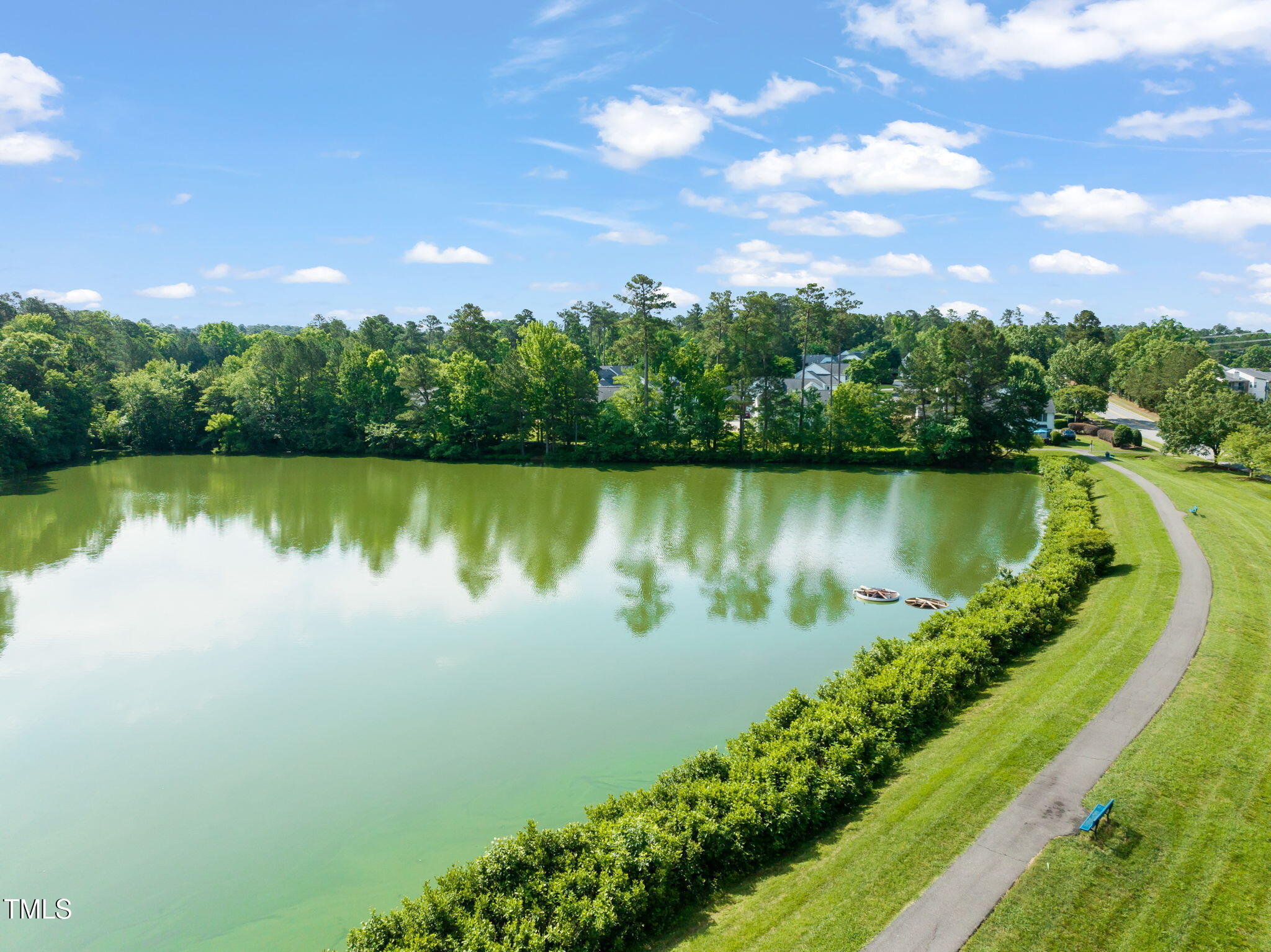 21 Cedar Hill Drive Durham, NC 27713 - Photo 39 of 45 a view of a lake with a city
