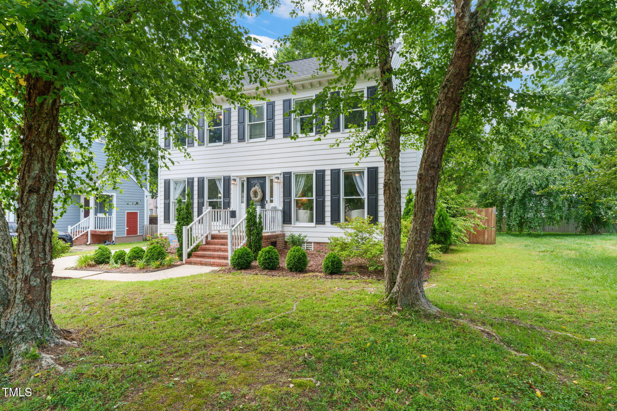 21 Cedar Hill Drive Durham, NC 27713 - Photo 4 of 45 a view of a house with a yard and plants