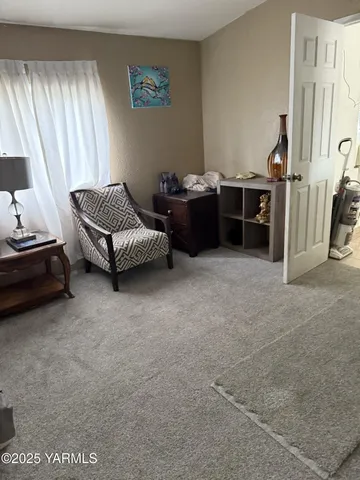 a bedroom with a bed and a cabinets