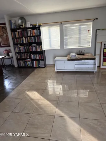 a living room with a large window