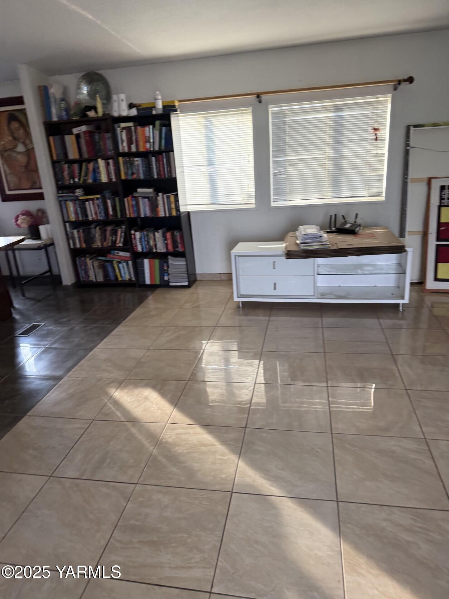 605 Dean Avenue Granger, WA 98932 - Photo 3 of 27 a living room with a large window