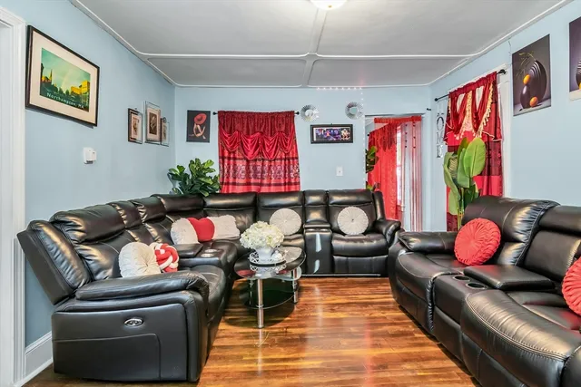 a room with furniture or couch and a window