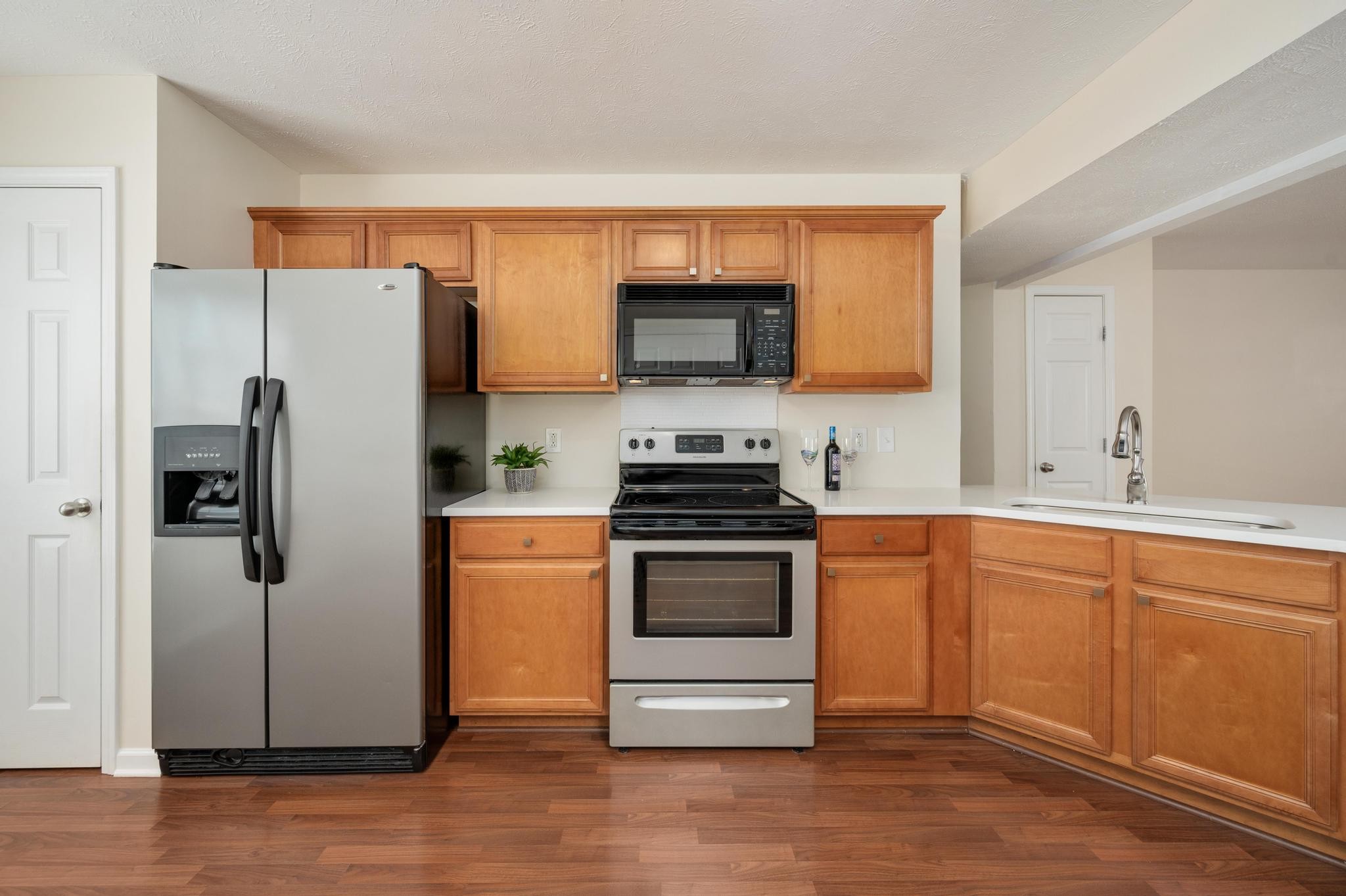 3016 London View Murfreesboro, TN 37128 - Photo 11 of 19 a kitchen with stainless steel appliances a refrigerator stove and microwave