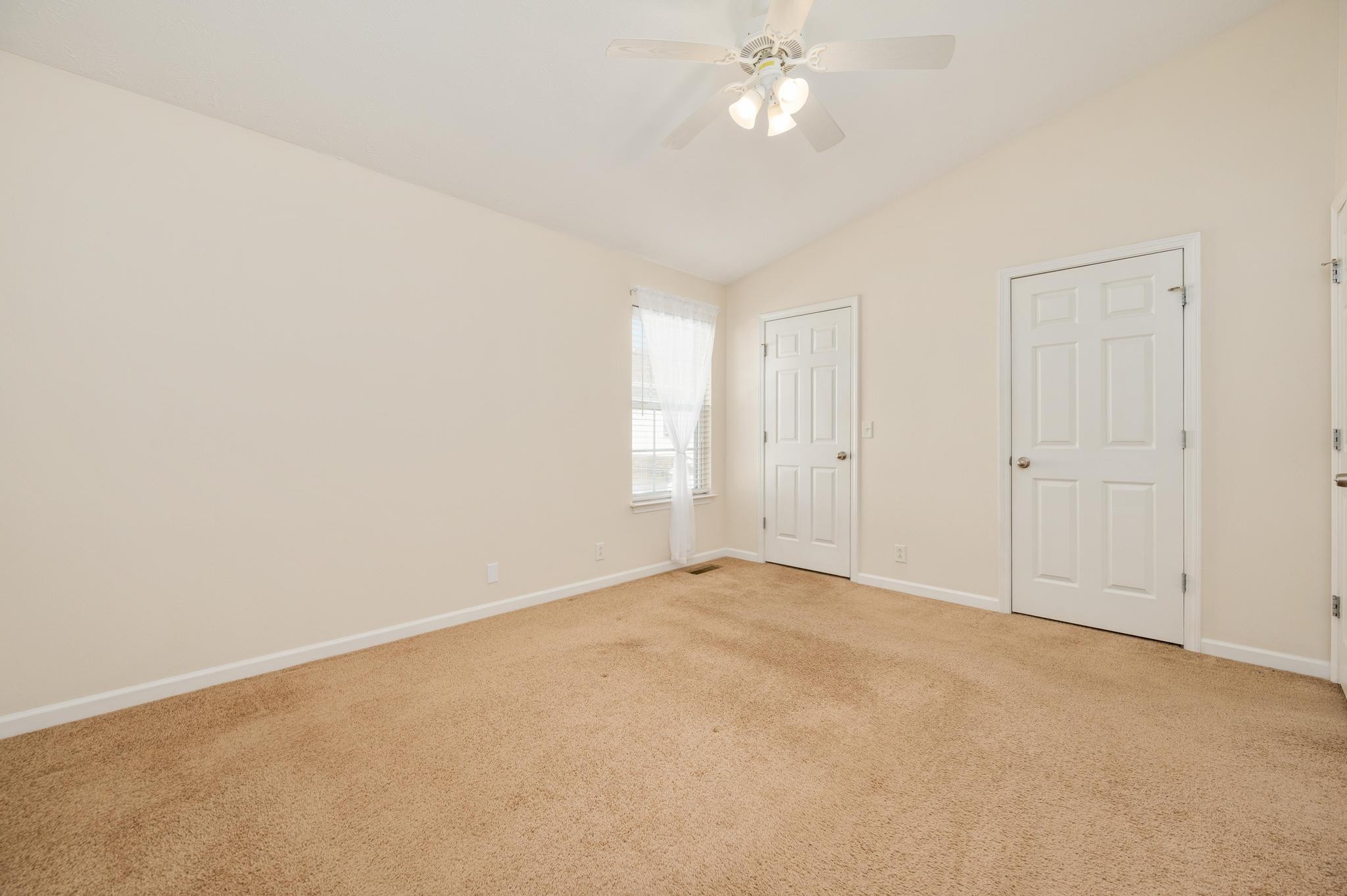 3016 London View Murfreesboro, TN 37128 - Photo 13 of 19 an empty room with a chandelier fan and windows