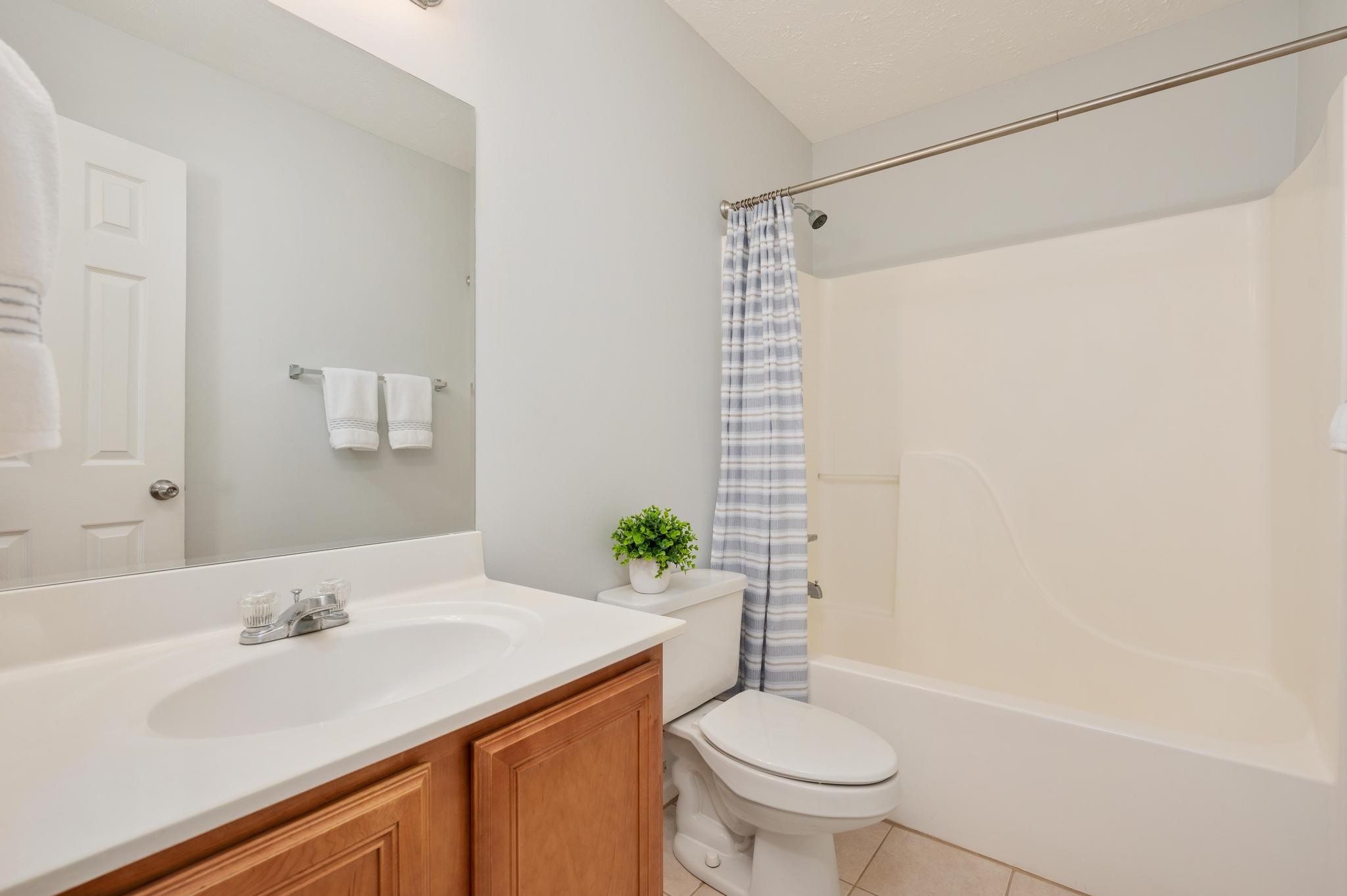3016 London View Murfreesboro, TN 37128 - Photo 14 of 19 a bathroom with a sink and a mirror