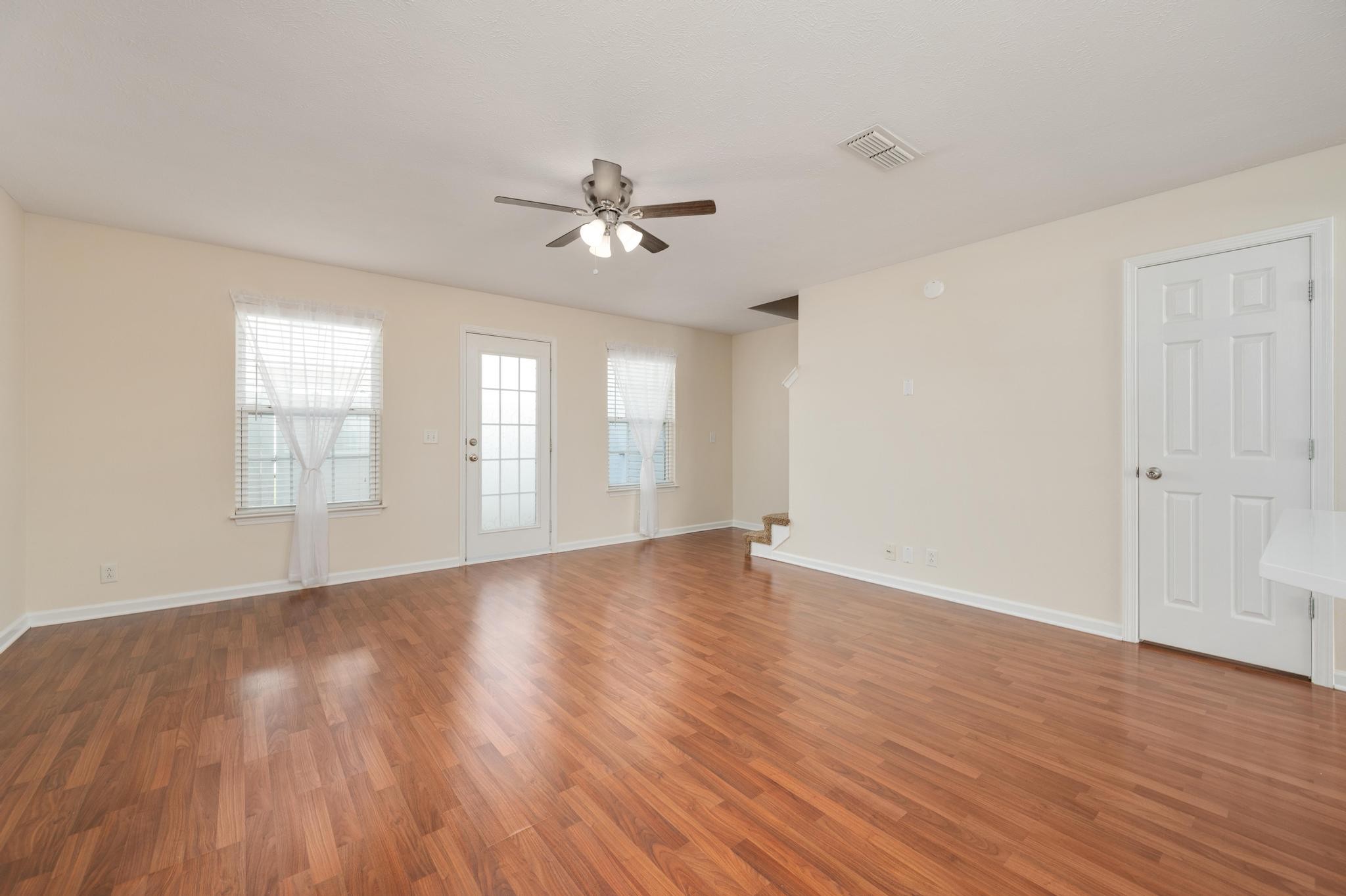 3016 London View Murfreesboro, TN 37128 - Photo 6 of 19 wooden floor in an empty room with a window