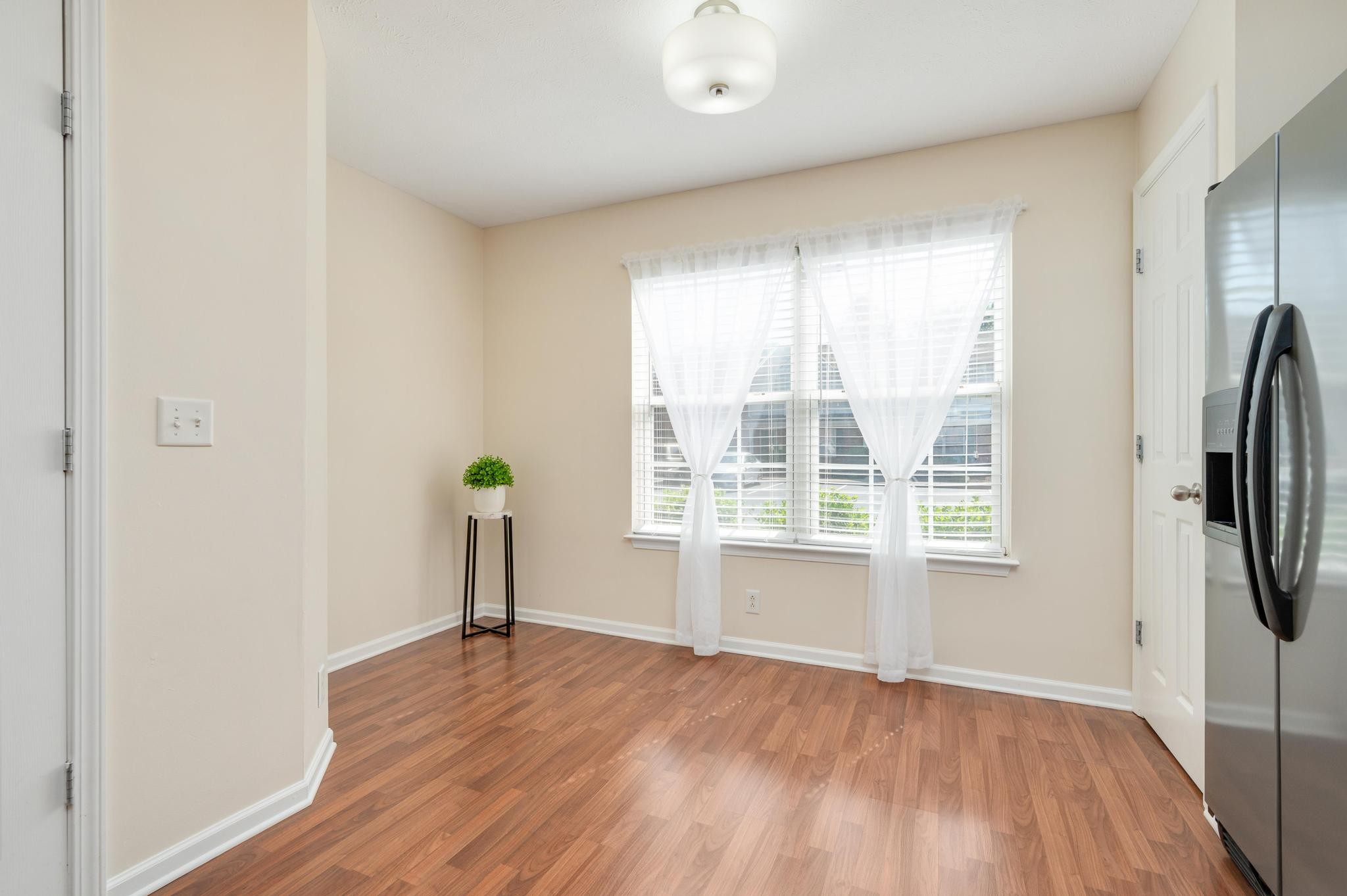 3016 London View Murfreesboro, TN 37128 - Photo 10 of 19 a view of empty room with wooden floor and fan