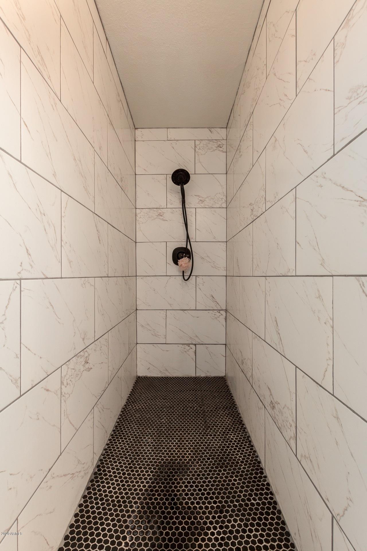 2439 East Riviera Drive Tempe, AZ 85282 - Photo 24 of 40 a bathroom with a shower