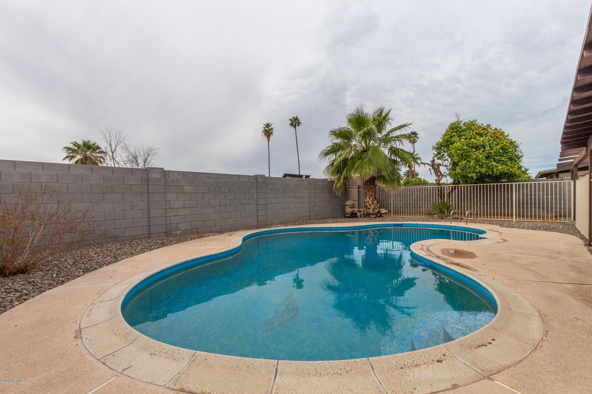2439 East Riviera Drive Tempe, AZ 85282 - Photo 36 of 40 a view of outdoor space and swimming pool