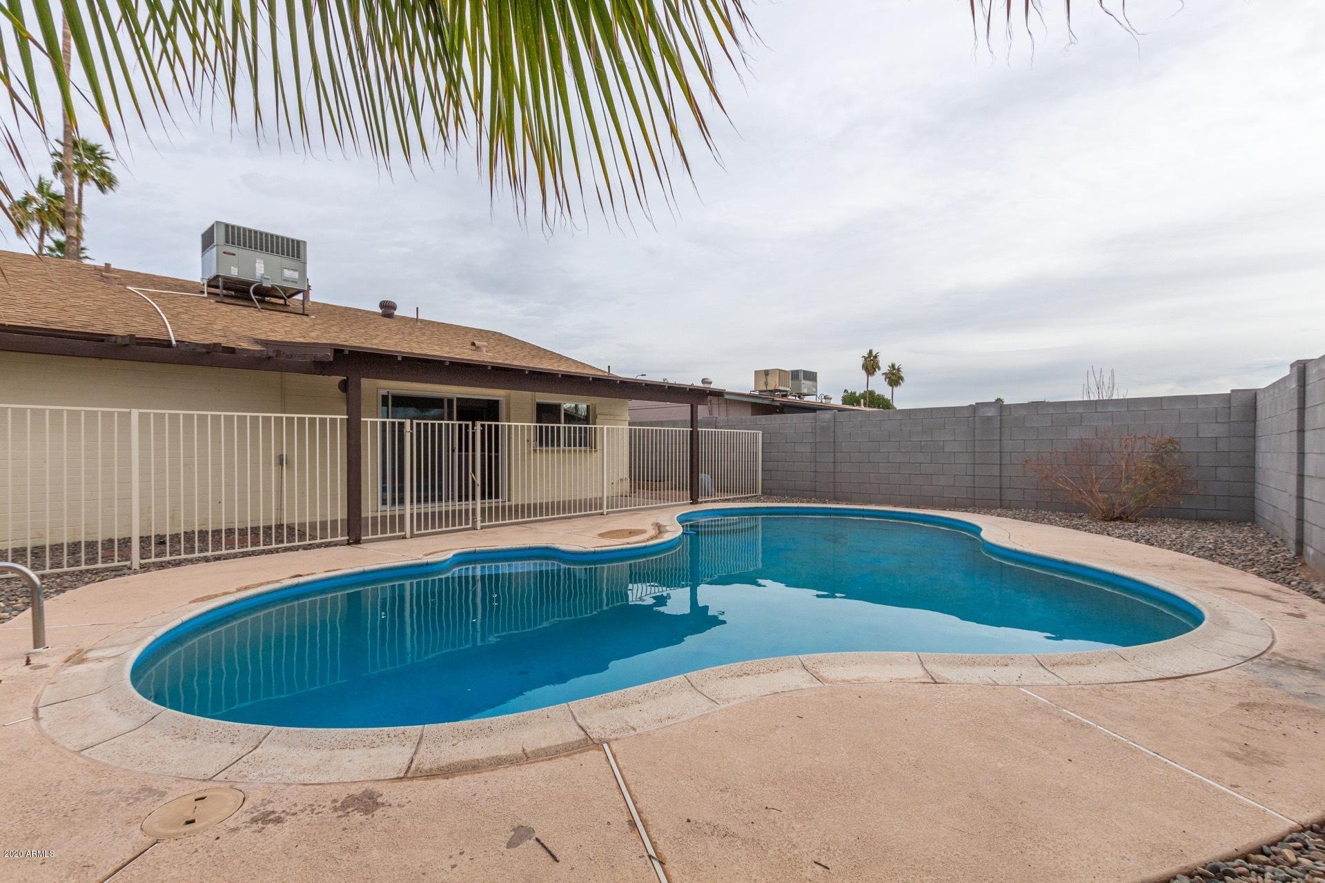 2439 East Riviera Drive Tempe, AZ 85282 - Photo 38 of 40 a view of a swimming pool with a patio