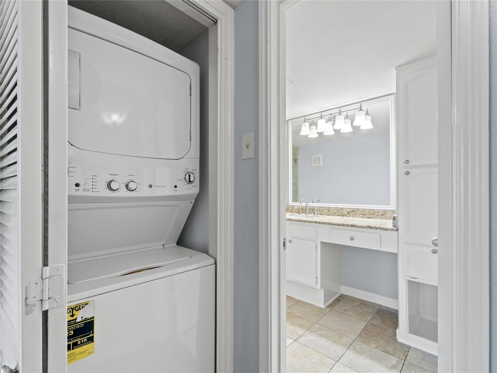 3101 Townbluff Drive, Unit 1024 Plano, TX 75075 - Photo 12 of 19 a utility room with dryer and washer