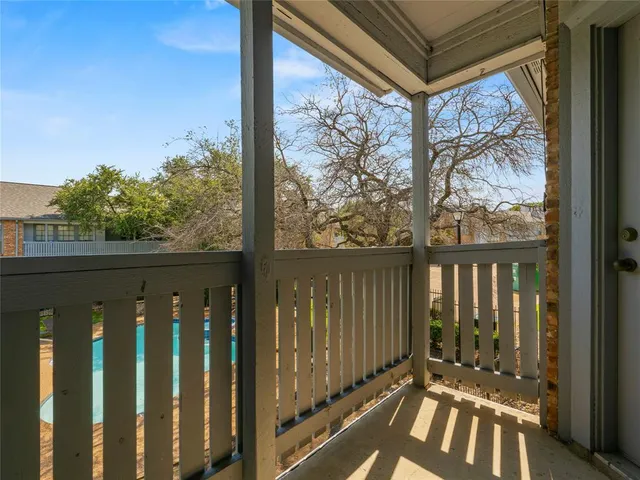 a view of a wooden fence