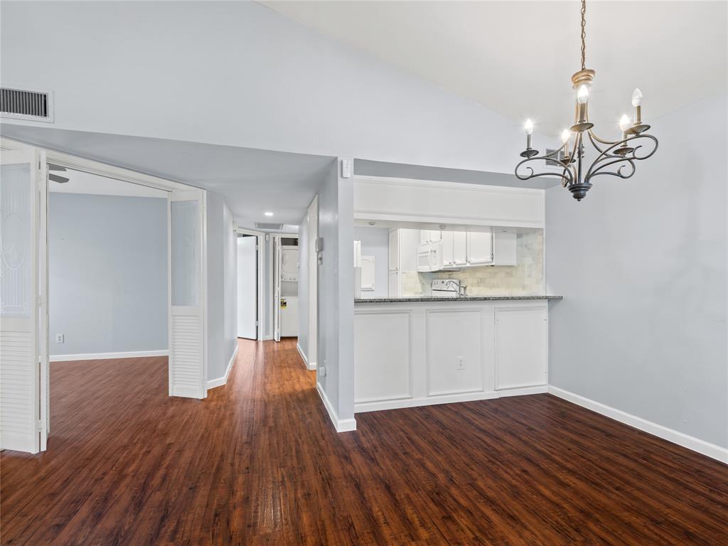 3101 Townbluff Drive, Unit 1024 Plano, TX 75075 - Photo 9 of 19 a view of a room with wooden floor and staircase
