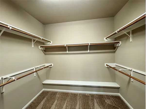 a view of a room with racks on the wall