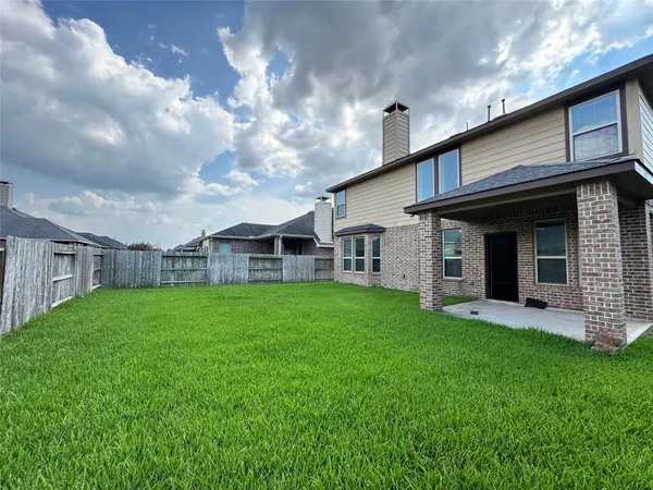 a view of a house with a garden