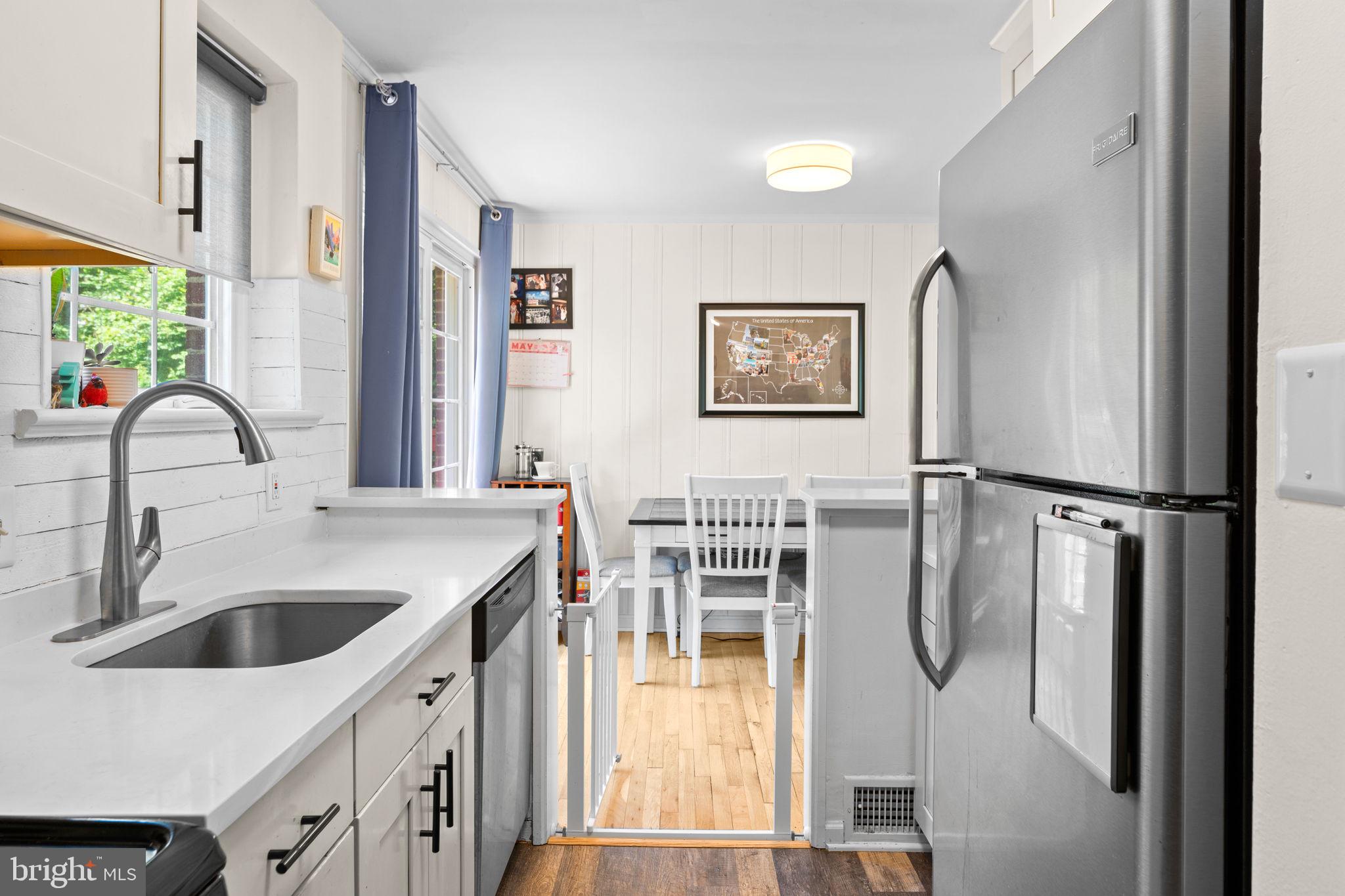 10310 Brunswick Avenue Silver Spring, MD 20902 - Photo 16 of 43 Charming kitchen with modern touches.