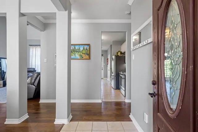 a view of livingroom with furniture and front door