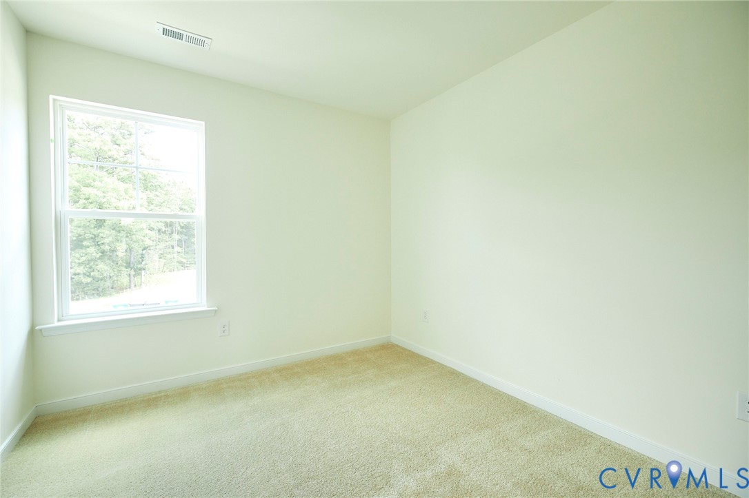 214 Greenpark Road Sandston, VA 23150 - Photo 29 of 50 Spare room featuring carpet and baseboards