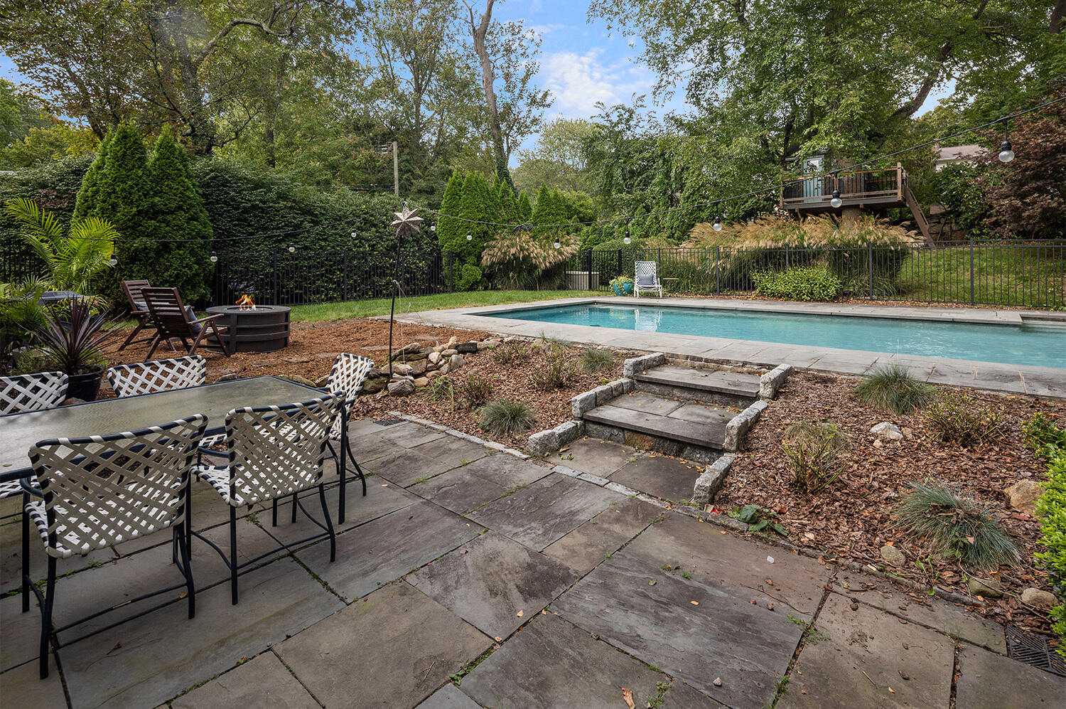 24 Salt Box Lane Darien, CT 06820 - Photo 14 of 32 a view of yard with seating area and trees around