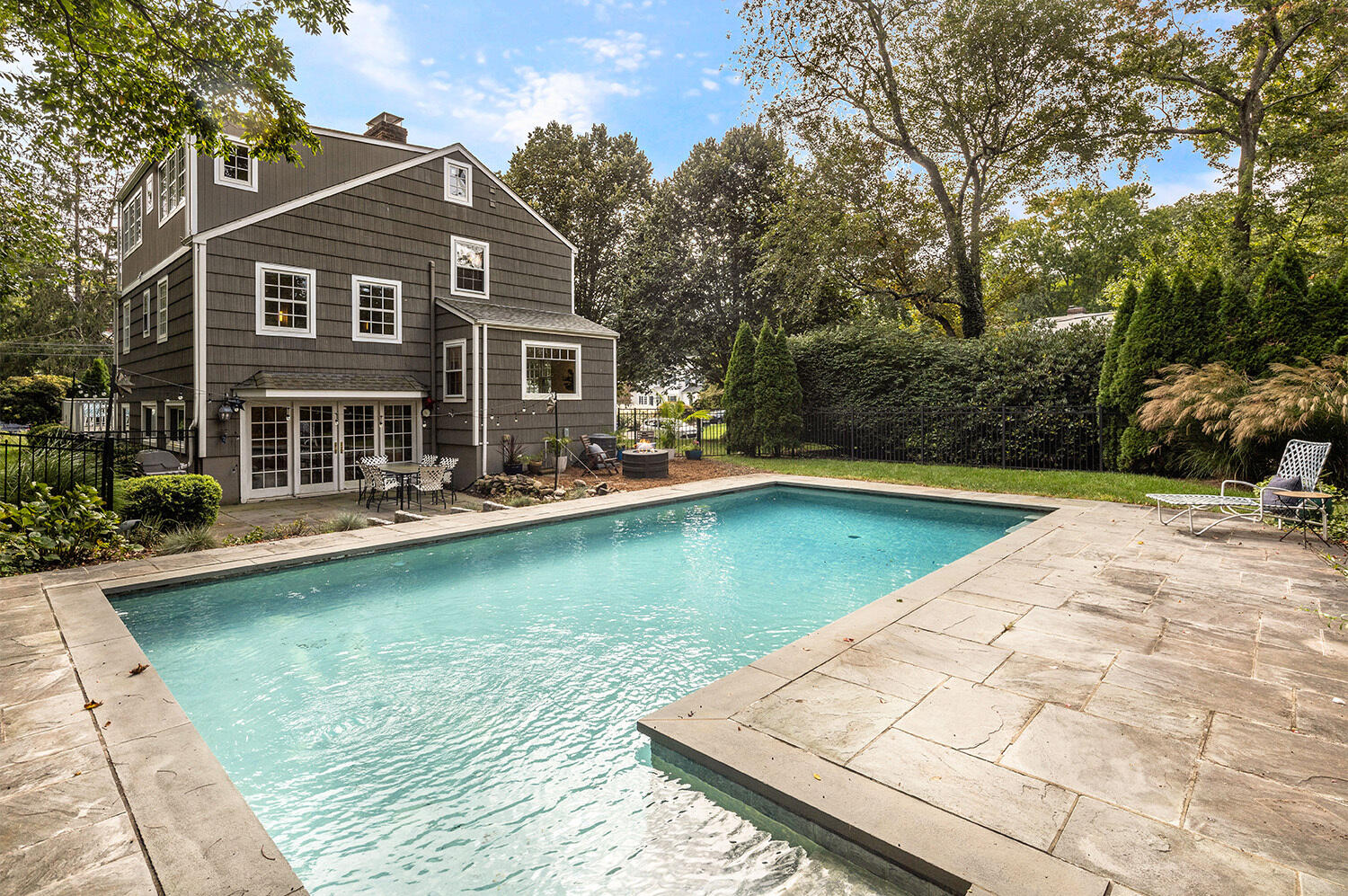 24 Salt Box Lane Darien, CT 06820 - Photo 15 of 32 a view of a house with swimming pool