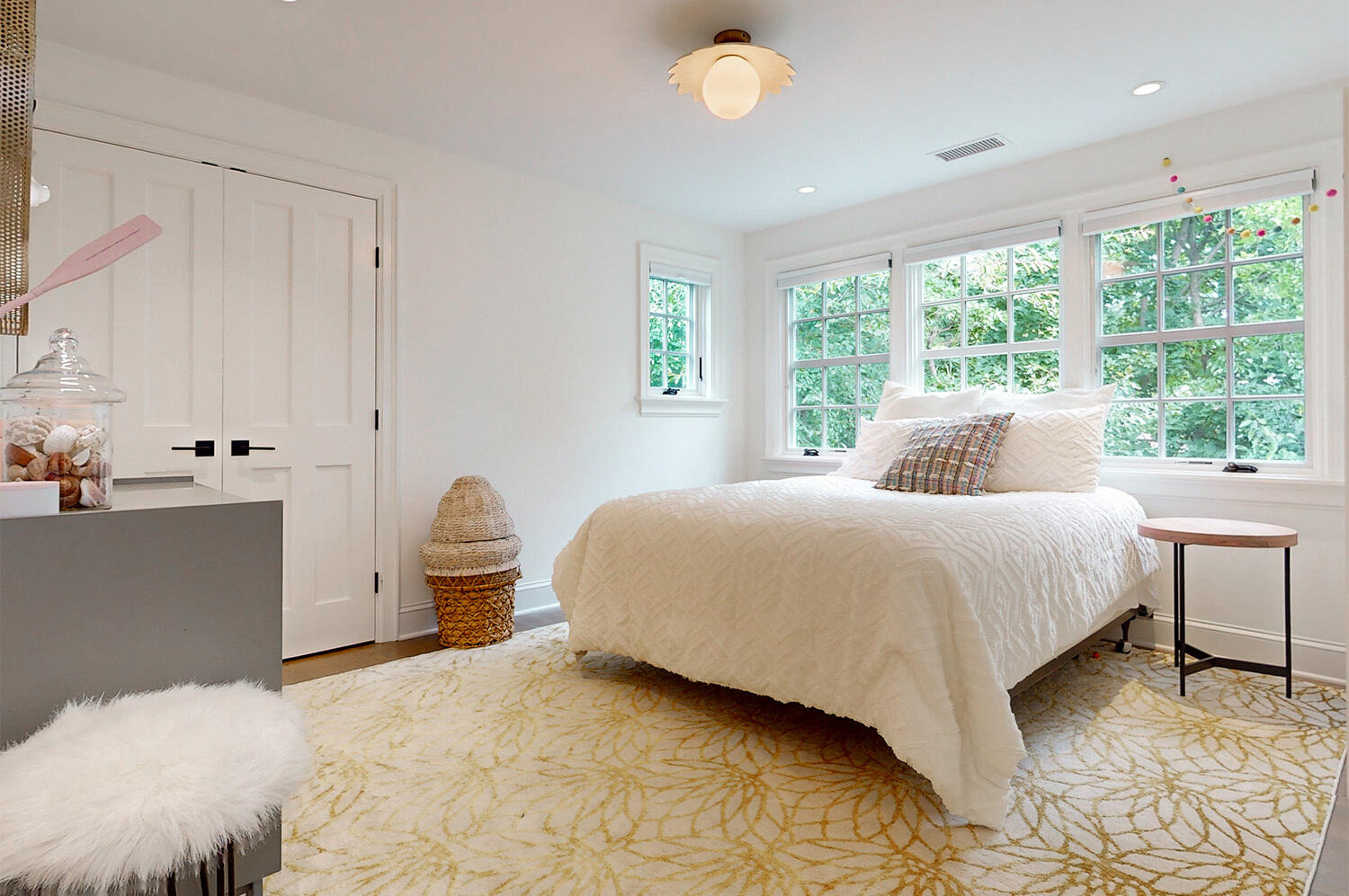 24 Salt Box Lane Darien, CT 06820 - Photo 26 of 32 a bedroom with a bed and a large window