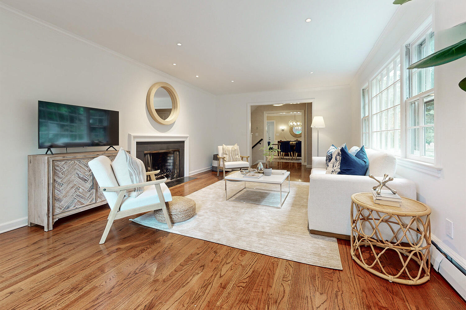 24 Salt Box Lane Darien, CT 06820 - Photo 6 of 32 a living room with furniture a fireplace and a flat screen tv