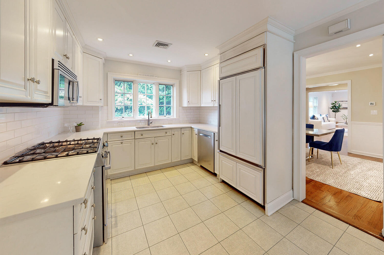 24 Salt Box Lane Darien, CT 06820 - Photo 8 of 32 a kitchen with stainless steel appliances granite countertop a stove a sink and a refrigerator