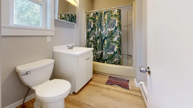 a bathroom with a sink and toilet