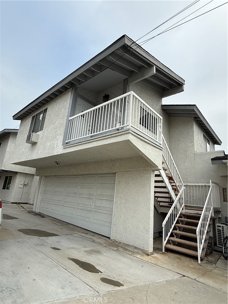 1131 252nd Street, Unit B Harbor City, CA 90710 - Photo 1 of 12 a view of outdoor space with porch and garden