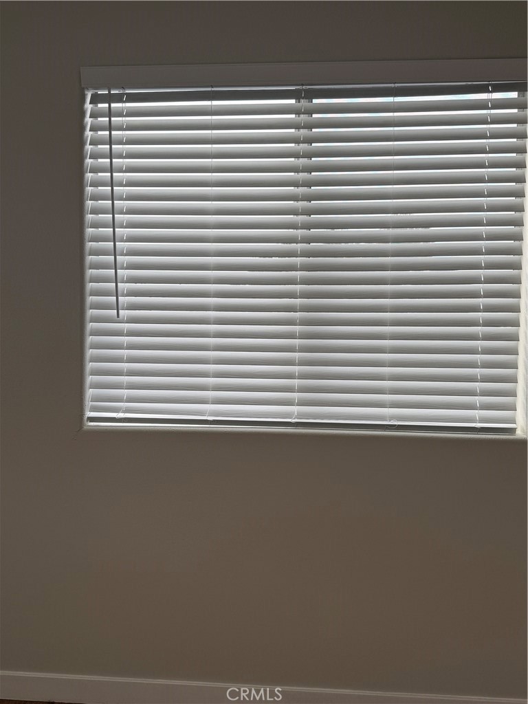 1131 252nd Street, Unit B Harbor City, CA 90710 - Photo 10 of 12 a view of a room that has a window in it