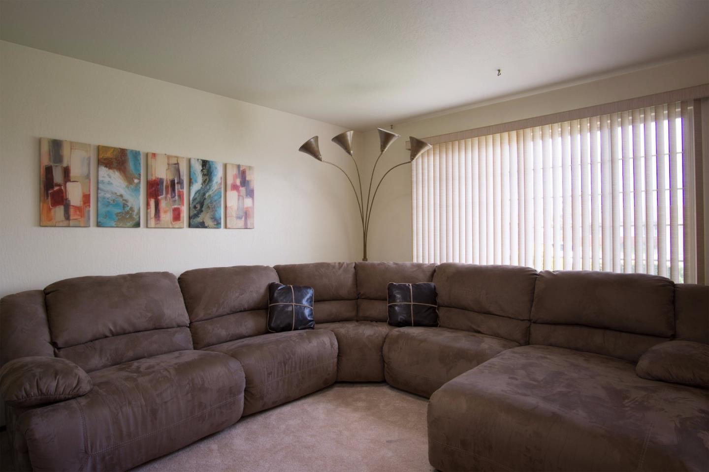 1626 Atherton Way Salinas, CA 93906 - Photo 14 of 23 a living room with furniture and a large window
