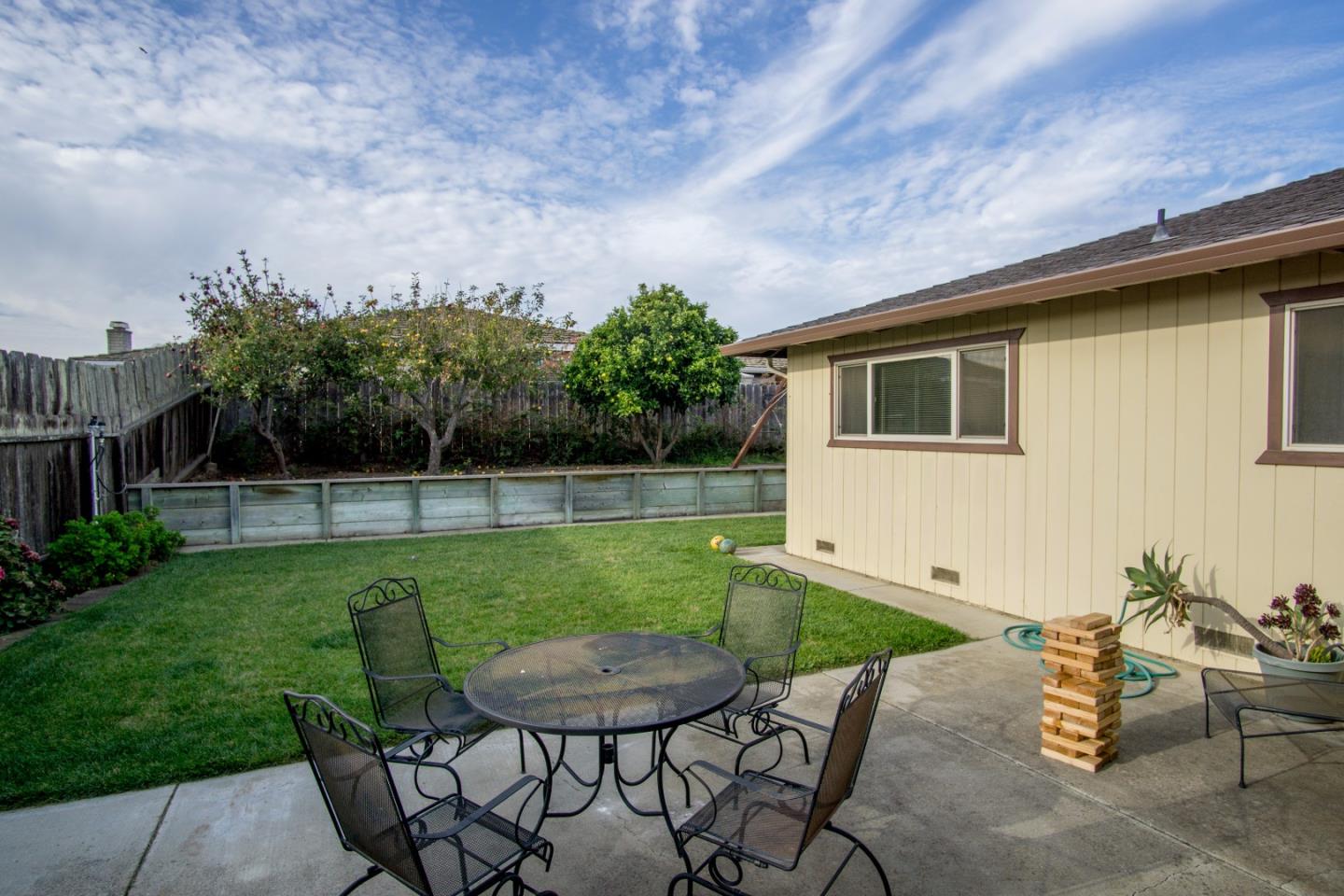 1626 Atherton Way Salinas, CA 93906 - Photo 4 of 23 a view of a chair and table in backyard