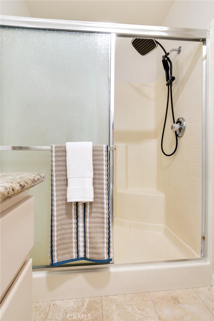 8955 Holly Lane Riverside, CA 92503 - Photo 17 of 32 a bathroom with a shower