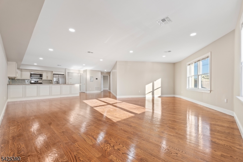 658 Market Street Paterson, NJ 07513 - Photo 12 of 19 a view of a kitchen with a sink and breakfast area