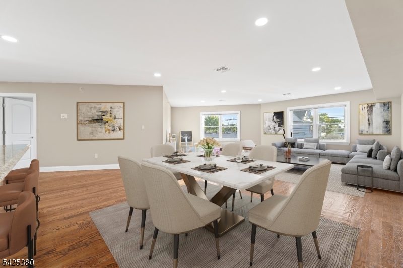658 Market Street Paterson, NJ 07513 - Photo 13 of 19 a view of a dining room with furniture and wooden floor