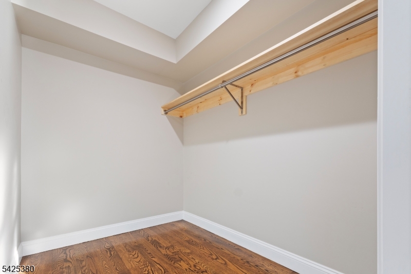 658 Market Street Paterson, NJ 07513 - Photo 7 of 19 a view of a room with racks on the wall