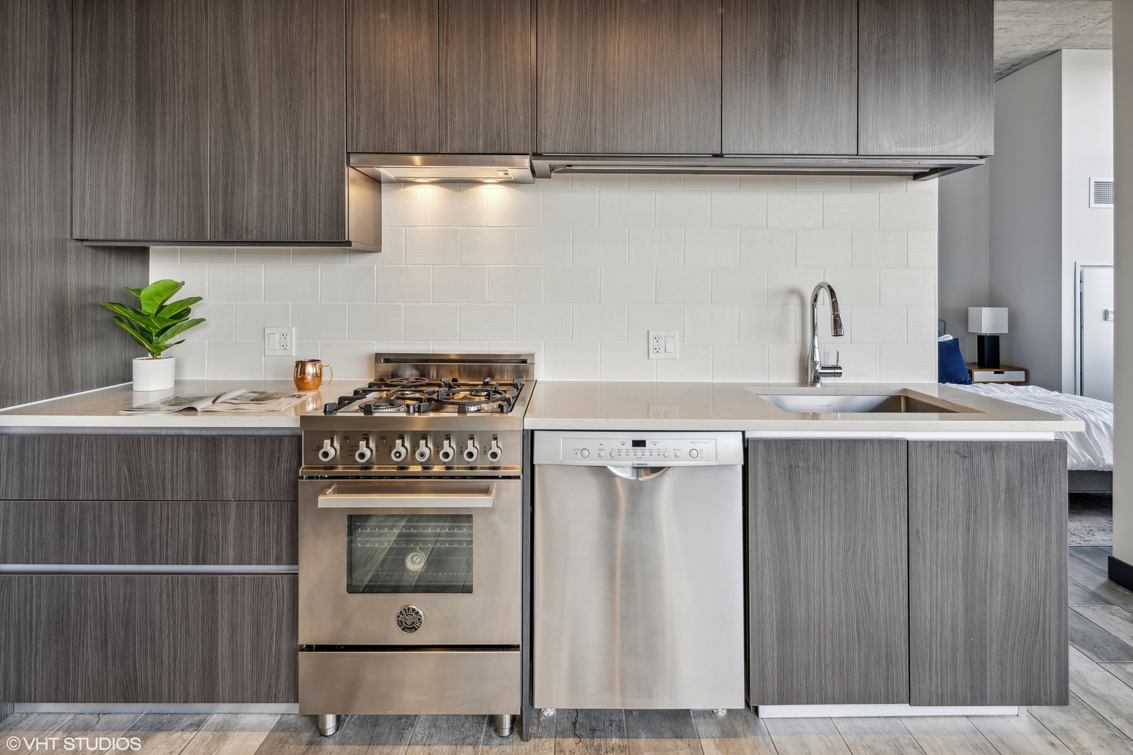171 North Aberdeen Street, Unit 804 Chicago, IL 60607 - Photo 6 of 23 a kitchen with appliances cabinets and a counter top space