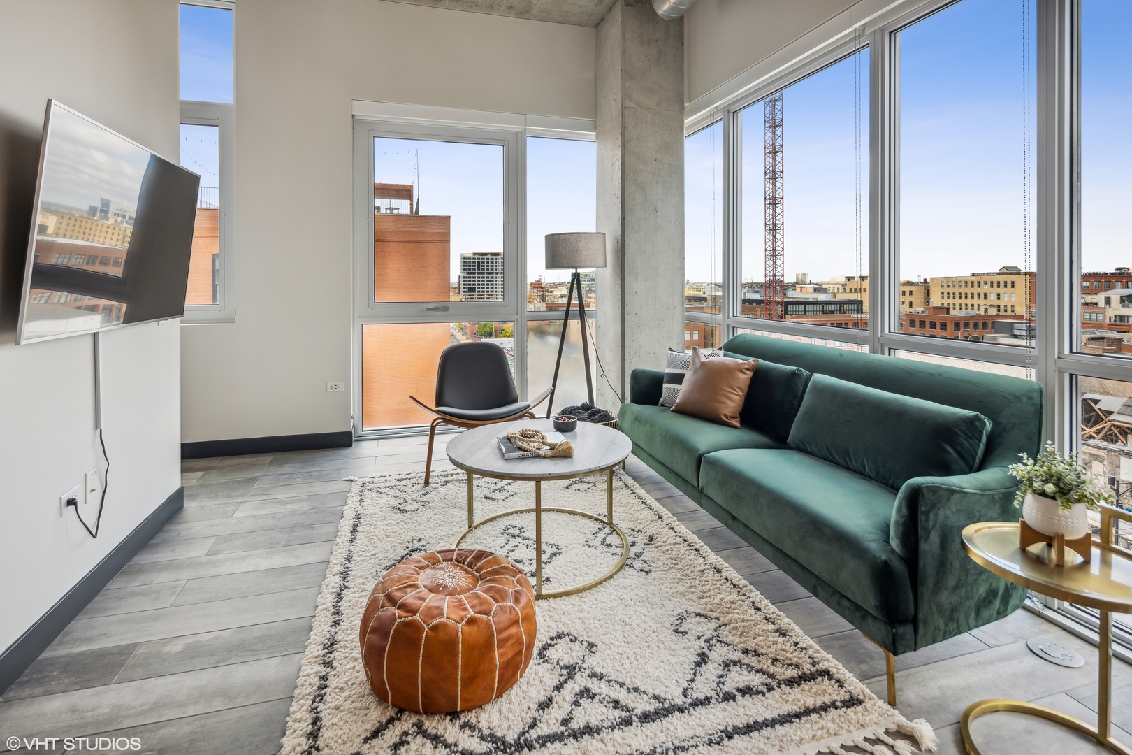 171 North Aberdeen Street, Unit 804 Chicago, IL 60607 - Photo 7 of 23 a living room with furniture and a floor to ceiling window