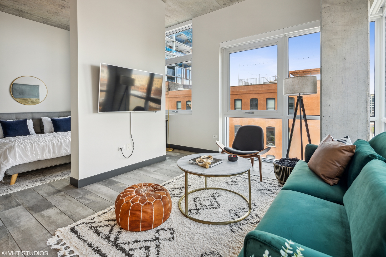 171 North Aberdeen Street, Unit 804 Chicago, IL 60607 - Photo 8 of 23 a living room with furniture and a flat screen tv