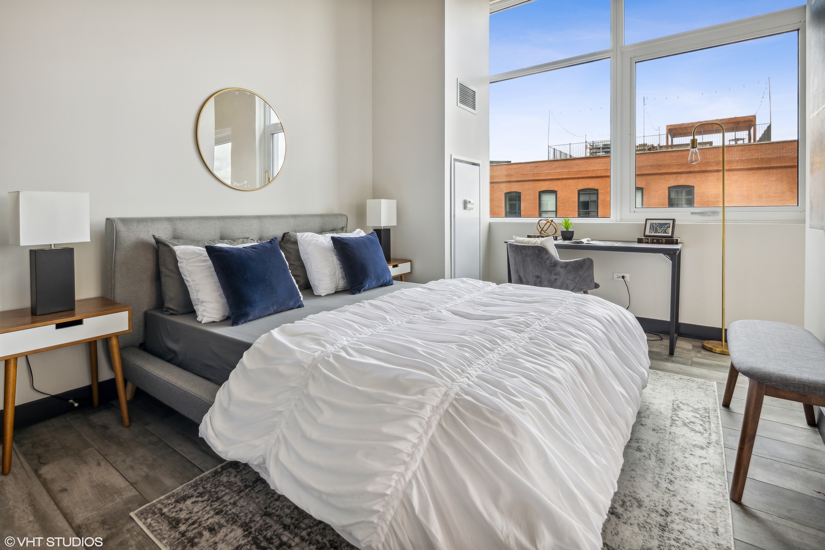 171 North Aberdeen Street, Unit 804 Chicago, IL 60607 - Photo 9 of 23 a bedroom with a bed and balcony view