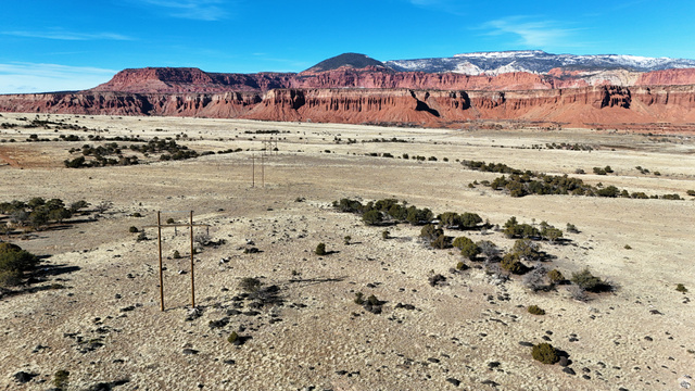 123 Teasdale Powerline Road Torrey, UT 84773 - Photo 38 of 62 View of mountain background with a desert landscape and rural landscape