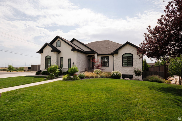 924 Country Lane Farmington, UT 84025 - Photo 5 of 91 Contemporary residence featuring light-colored stone and stucco exterior with dark trim accents