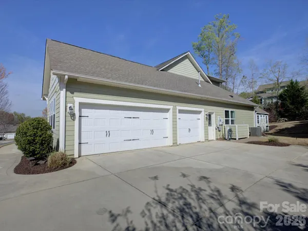 a view of garage and yard